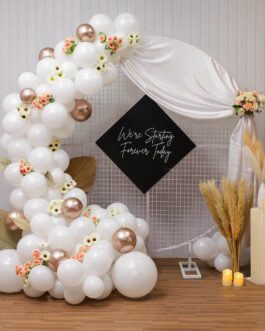 Neutral Tones Balloons and Flowers Ring decor For Roka Ceremony
